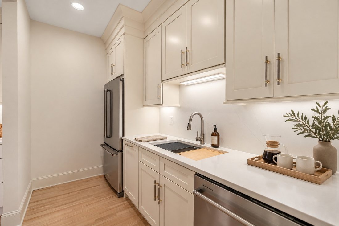 Scullery sink and storage (virtually staged)