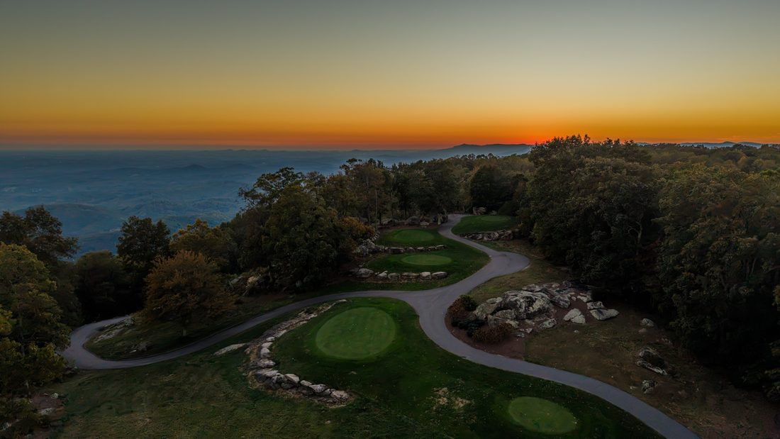 Aerial, a green at sunset